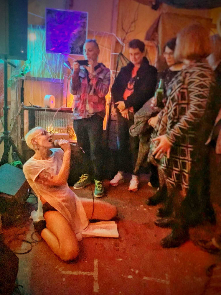 Jane performing live with back of the brain in Salford in November 2023