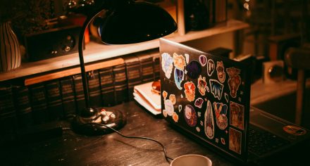Image of laptop with stickers via Svetlana Romashenko on Pexels