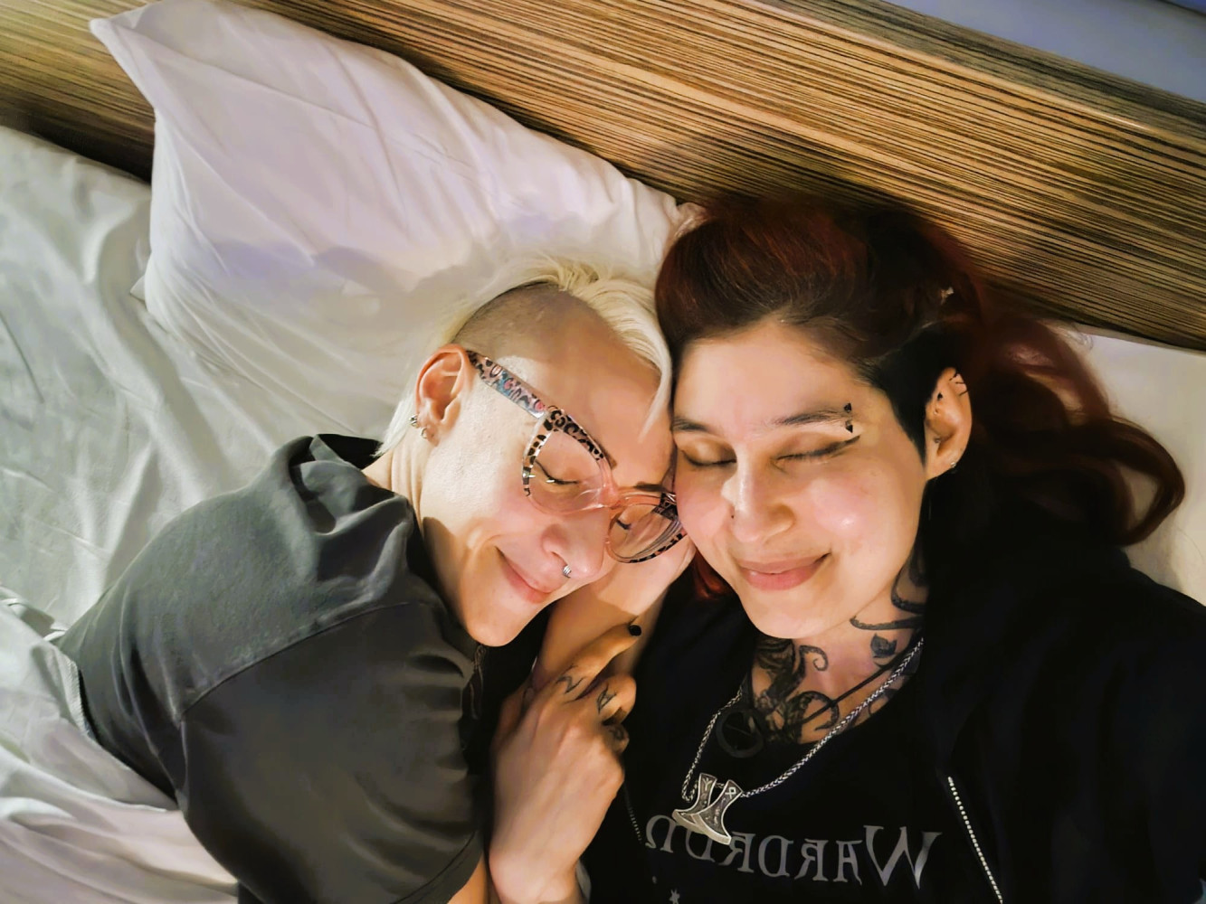 Jane and Avadrian lying in bed after a day out at the Jorvik Viking Festival in February 2025