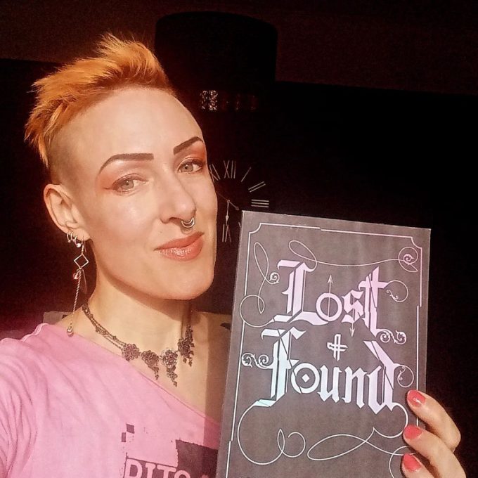 Jane Claire Bradley with her chapbook Lost + Found