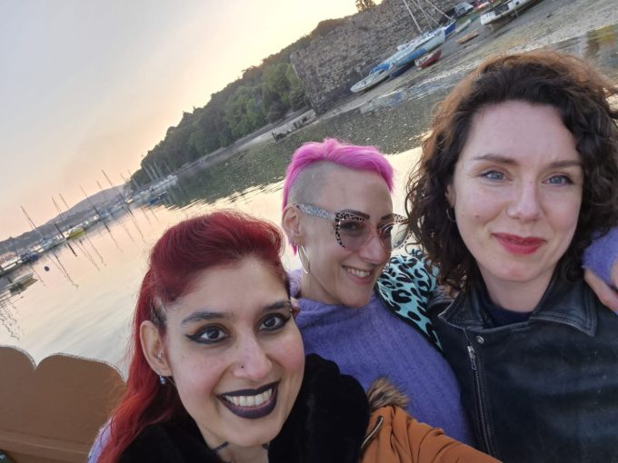 Jane, Fiona and Avadrian on the shores of Conwy at sunset